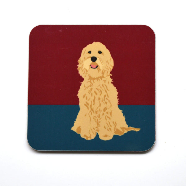 High gloss melamine cork backed coaster. Handmade in the UK, with a sustainably sourced Eucalyptus board base, a full melamine surface, with cork backing. 3.2mm thickness board Square with round corners. Size: 100mm x 100mm Made and printed in the UK. Coaster, Cockapoo, The Dog Collection
